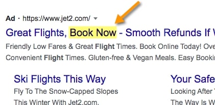 Example of the Book Now call to action phrase from a Google ad